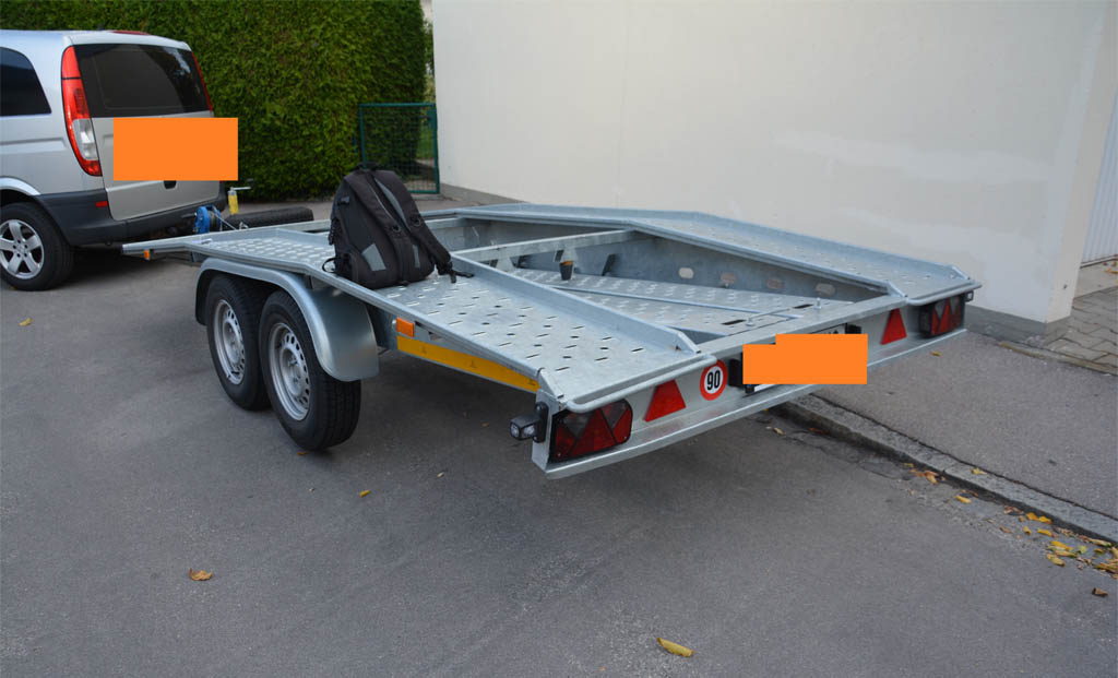Open road trailer. Shop selling car trailers.
